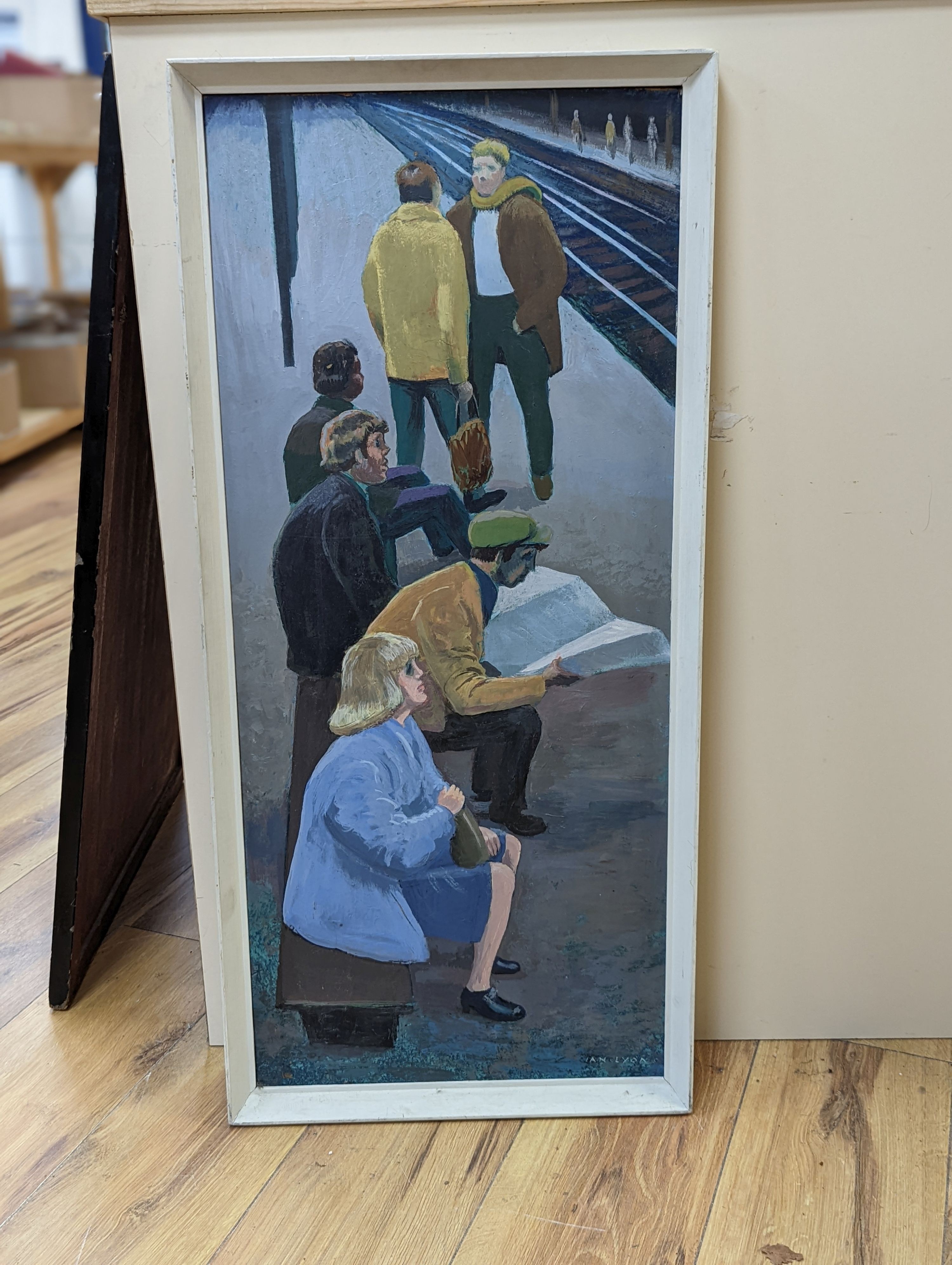 Ian Lyons, oil on board, Figures waiting for a train, signed, 76cm x 33cm